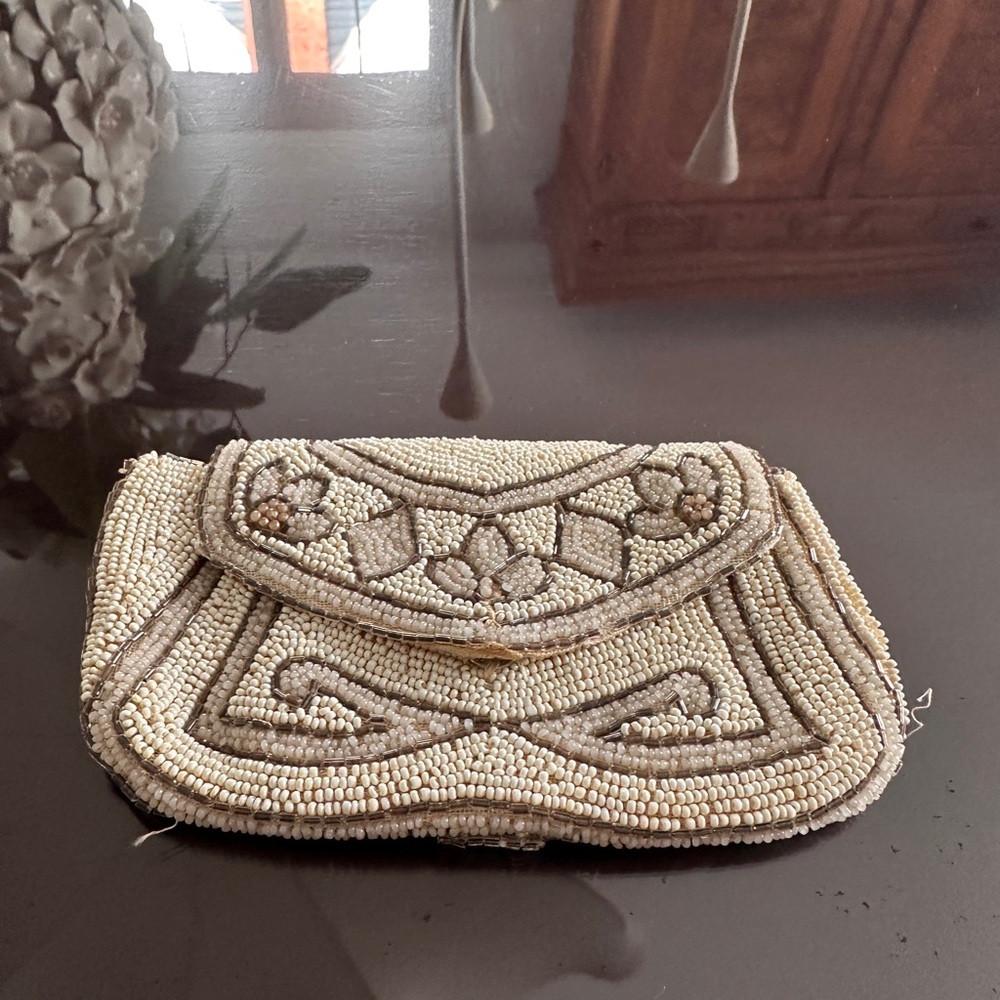 Cream Decorative Clutch with Intricate Beadwork